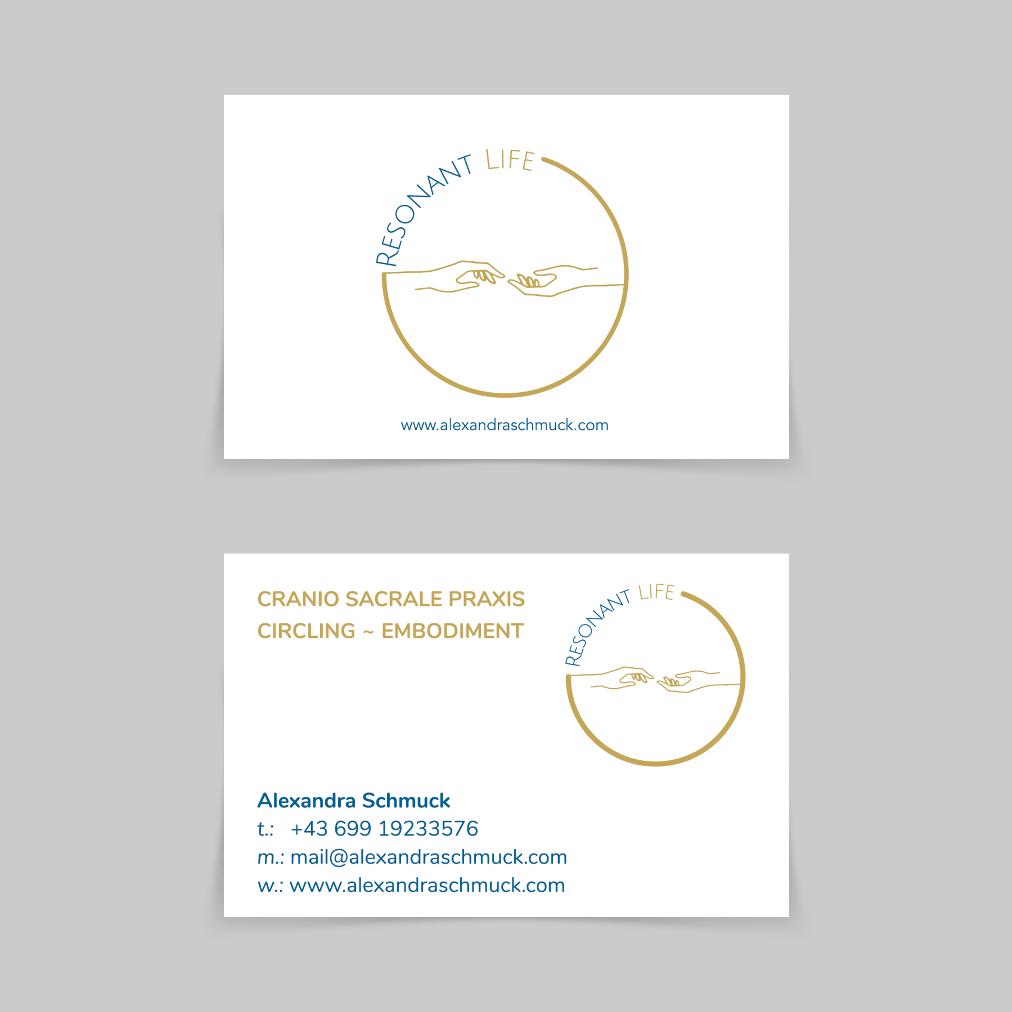 two business cards with grey background